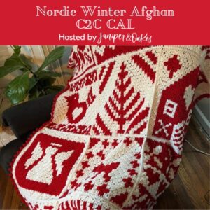 Cozy Nordic winter afghan featuring red and white crochet patterns, perfect for holiday decor and wi.