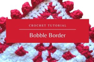 Bright red and white crochet bobble border pattern for decorative crafts.