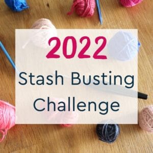Yarn balls and crochet hook for stash busting challenge 2022.