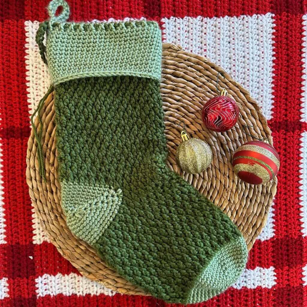 Alpine Christmas stocking crochet pattern, perfect for holiday decor and gift-giving. Handmade with.