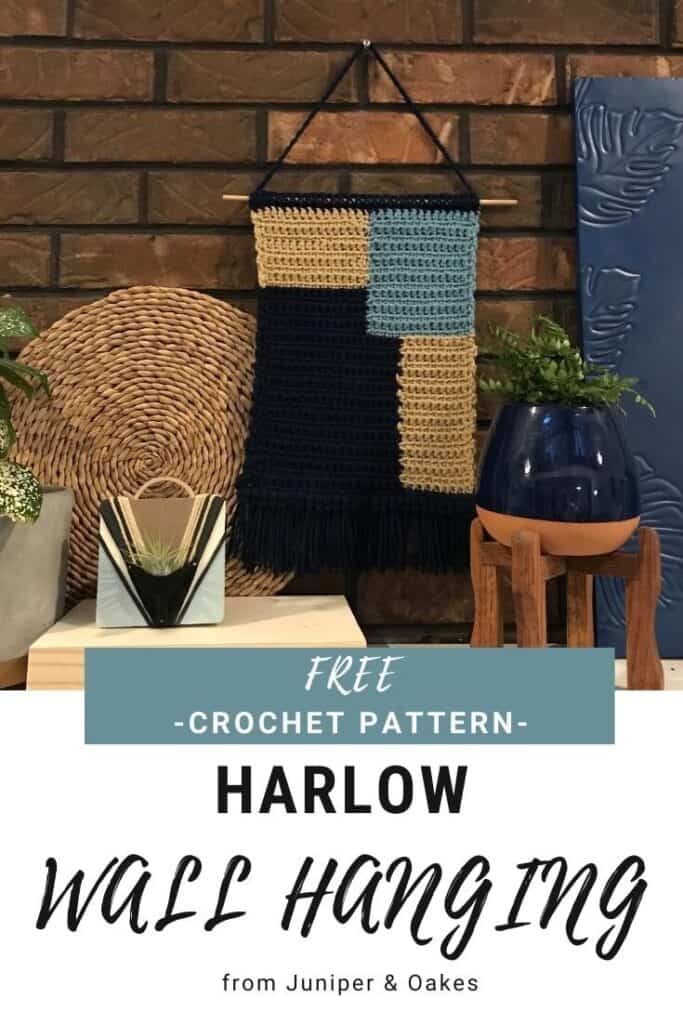 Harlow wall hanging crochet pattern with geometric design in blue, beige, and black.