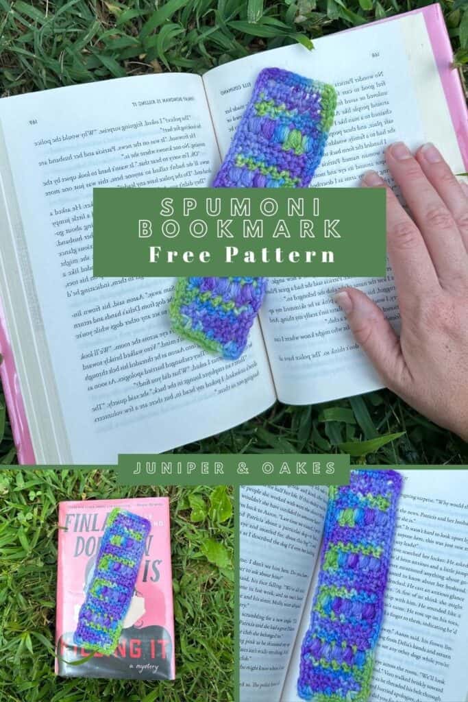 Handmade colorful bookmark with blue, green, and purple yarn, displayed on an open book outdoors.