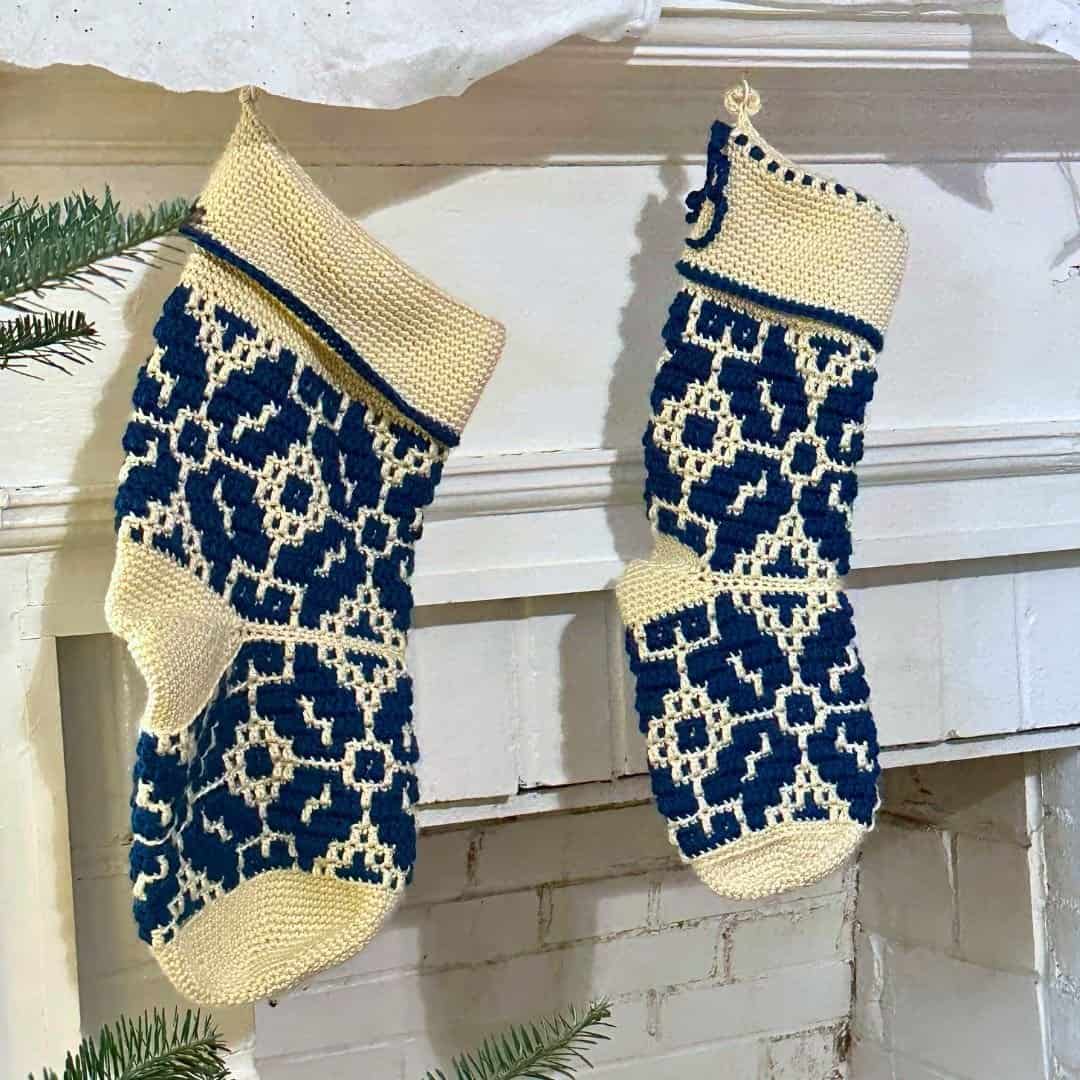 Christmas stockings hanging on a white fireplace mantel.