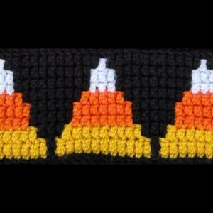 Colorful candy corn mosaic crochet pattern on black background, perfect for fall decor.