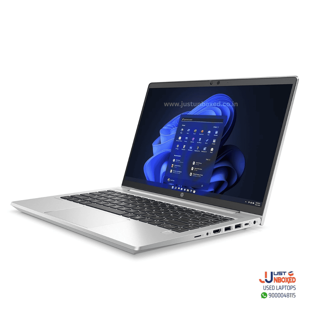 Dell silver laptop with Windows 11 display, suitable for work and entertainment.