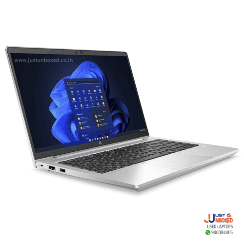 1. Hp laptop with Windows 11, sleek silver design, perfect for work and entertainment.