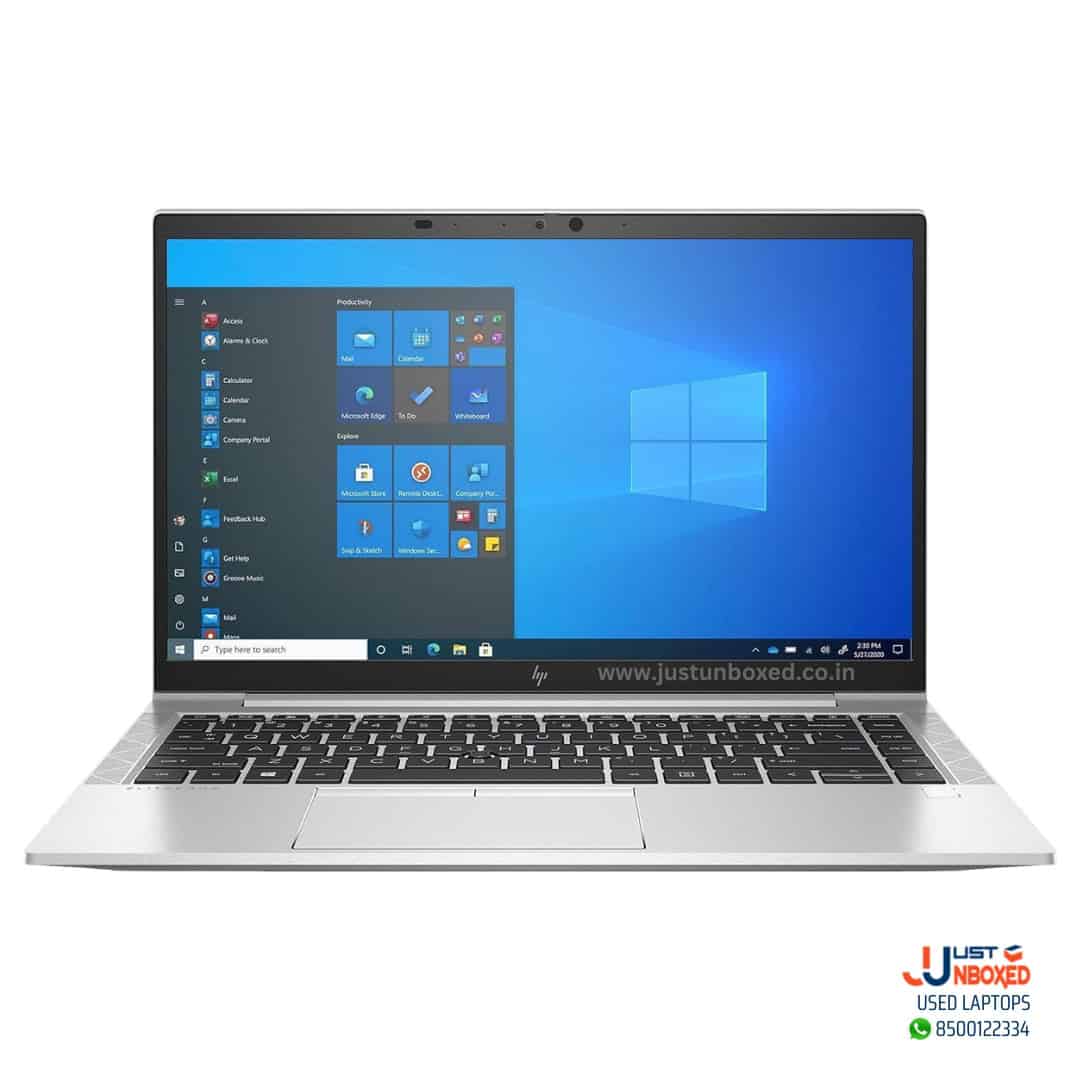 Light gray laptop with Windows 10 displayed, perfect for tech reviews and unboxing videos.