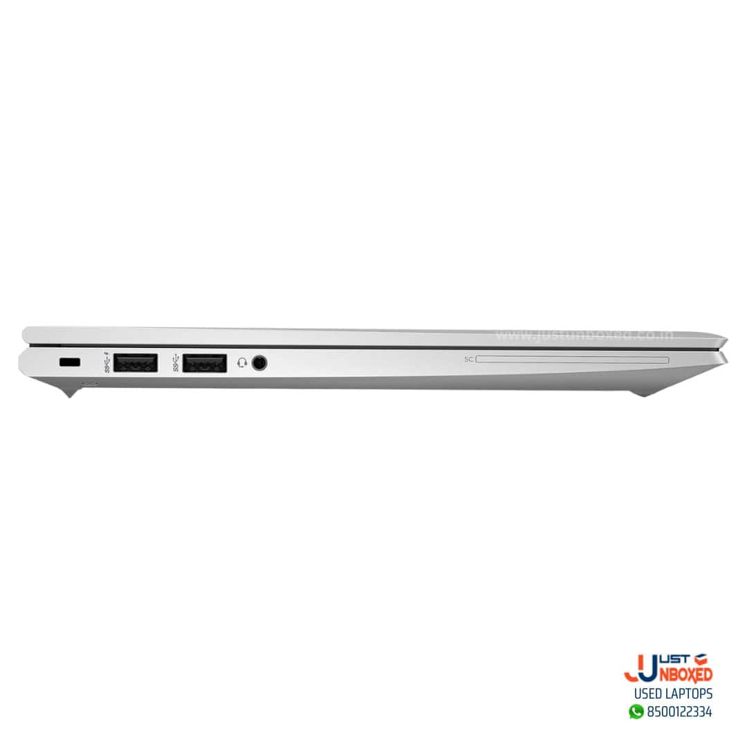 USB-C port, HDMI, USB-A ports, and headphone jack on silver laptop side.