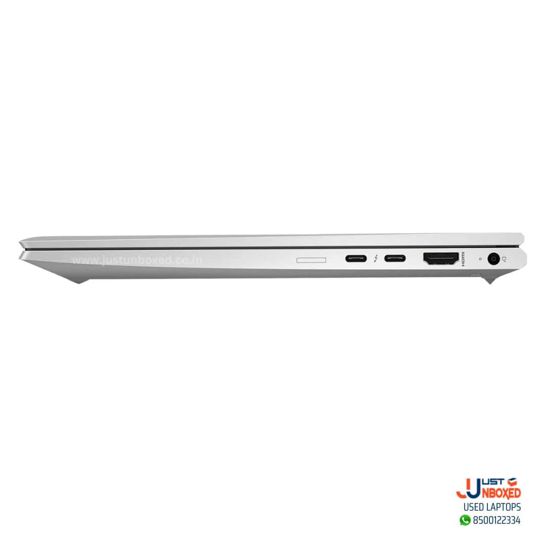 Ultra-slim laptop side view with multiple USB-C ports, HDMI, and audio jack, modern tech design.