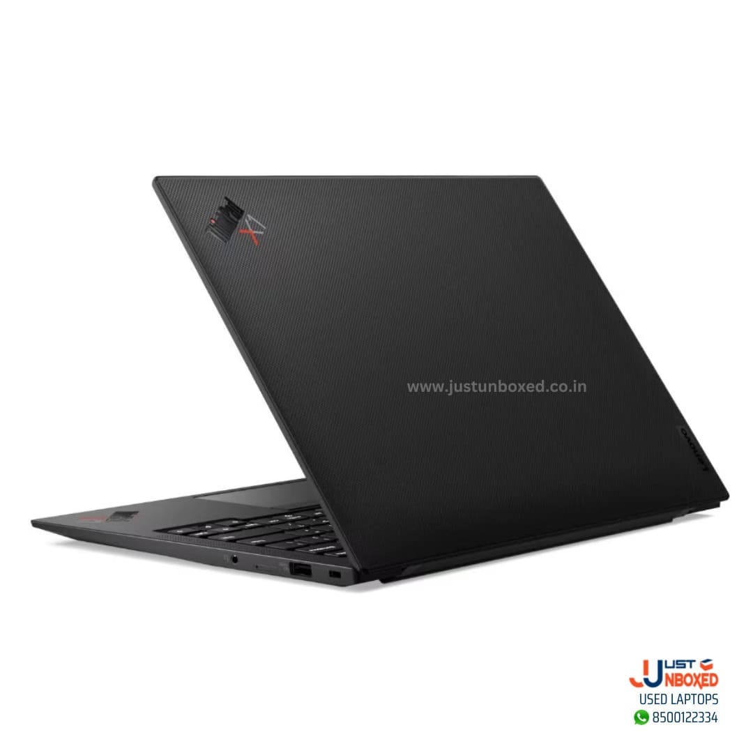 Flexible, sleek black laptop with textured surface, ideal for gaming and professional use.