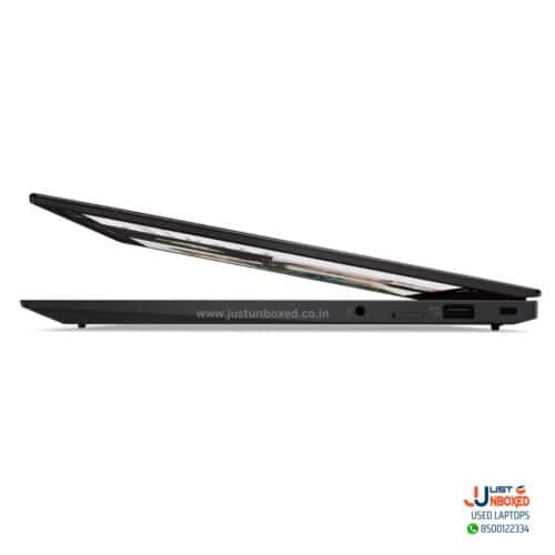 Slim black laptop with open lid highlighting sleek design and port connectivity.