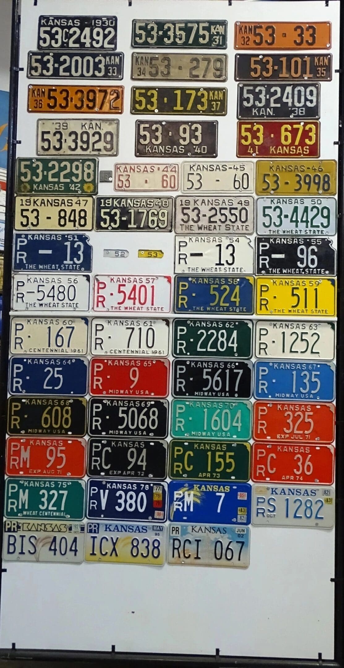 Kansas 1930 to 2002 car license plate run Pratt county