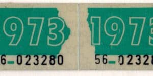 Iowa 1973 car license plate sticker pair Lee county #56-023280