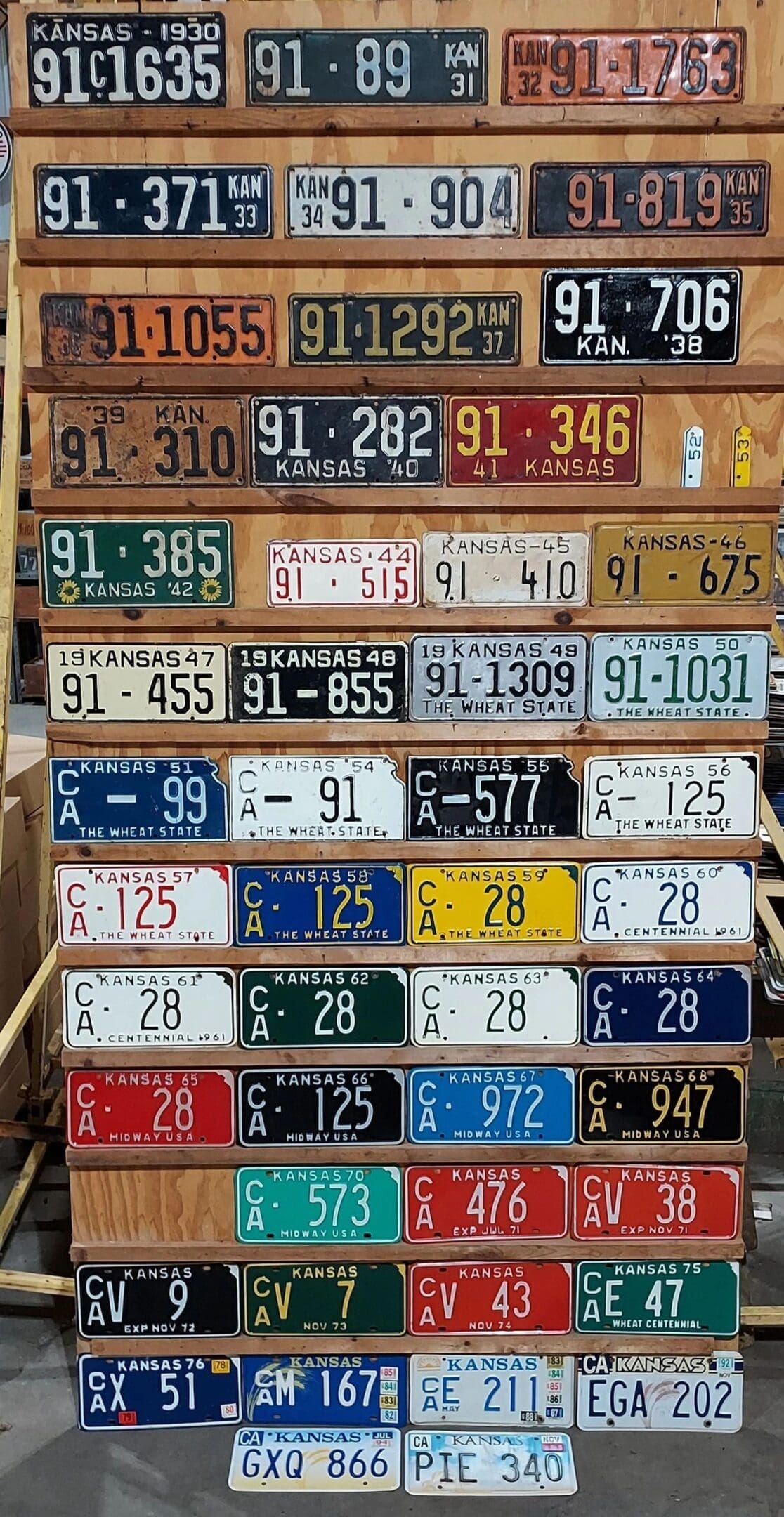 Kansas 1930 to 2002 car license plate run Clark county