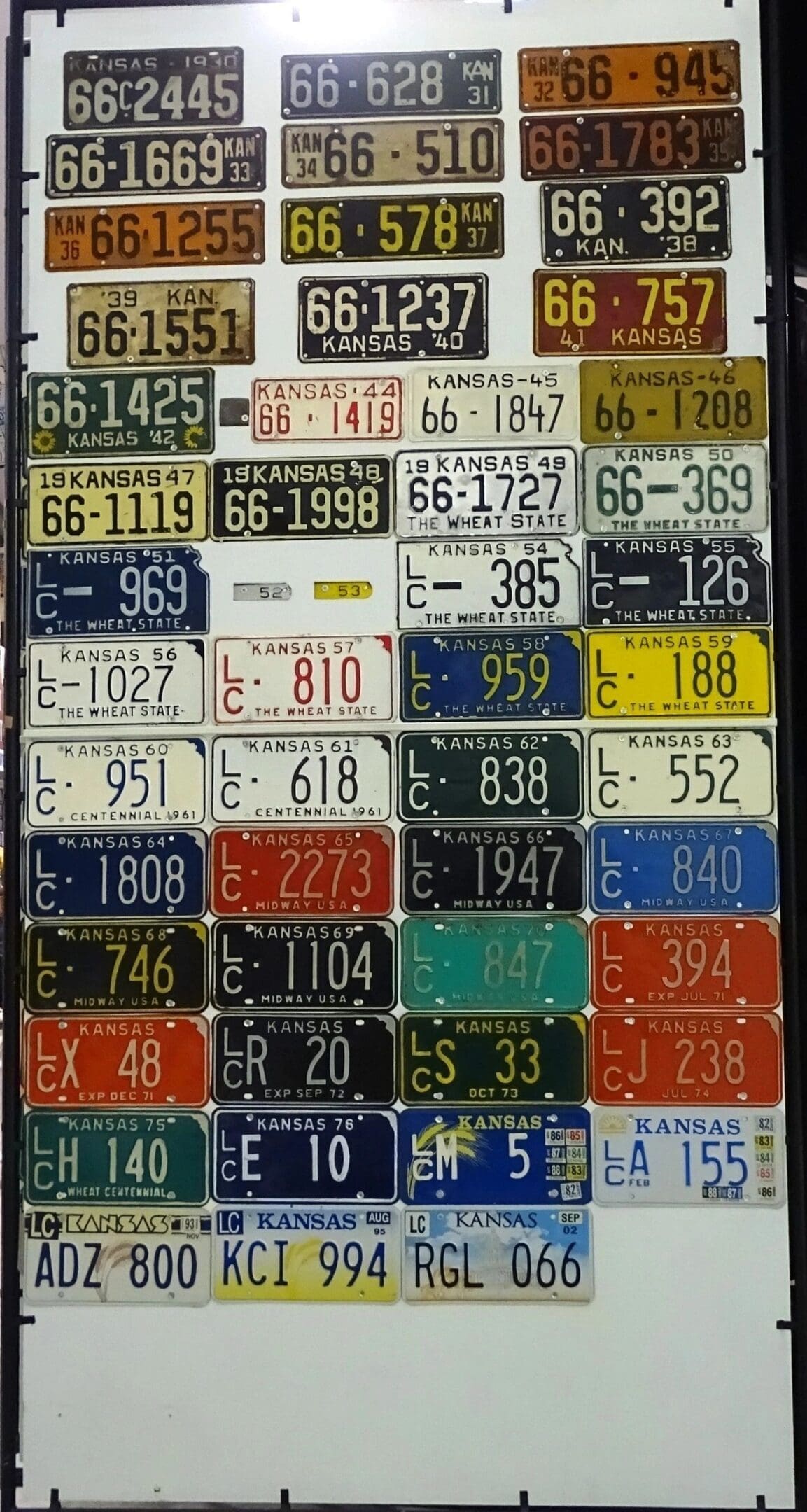 Kansas 1930 to 2002 car license plate run Lincoln county