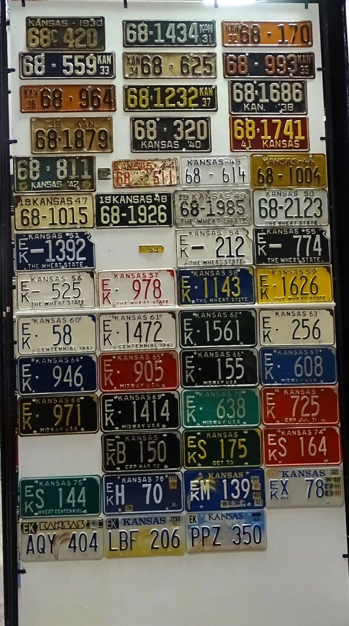 Kansas 1930 to 2002 car license plate run Elk county