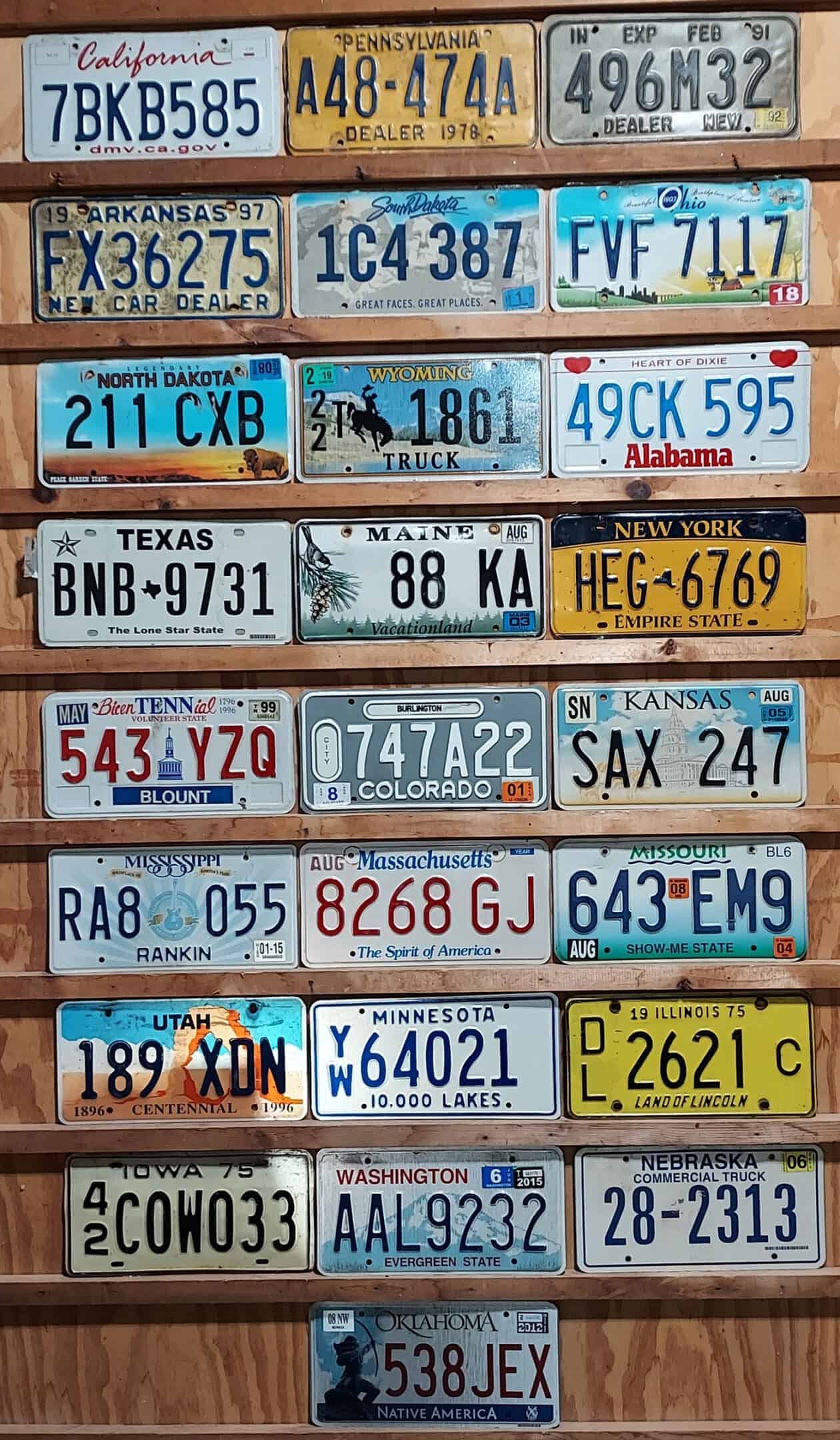 Lot of 25 different states license plates