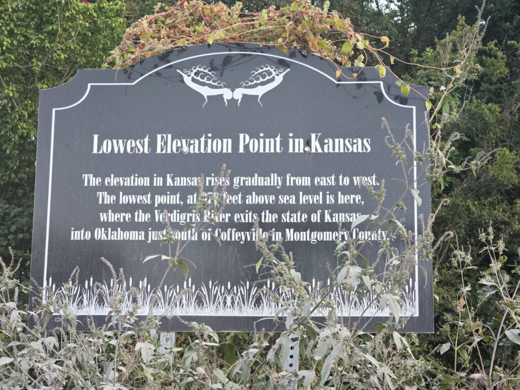 Sign showing the lowest point in Kansas at the Verdigris River-one of the 7 unique geographical points you can visit in Kansas