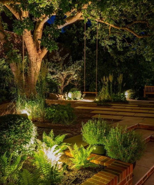 Garden lighting cost factors including pathway, patio, and deck lights.