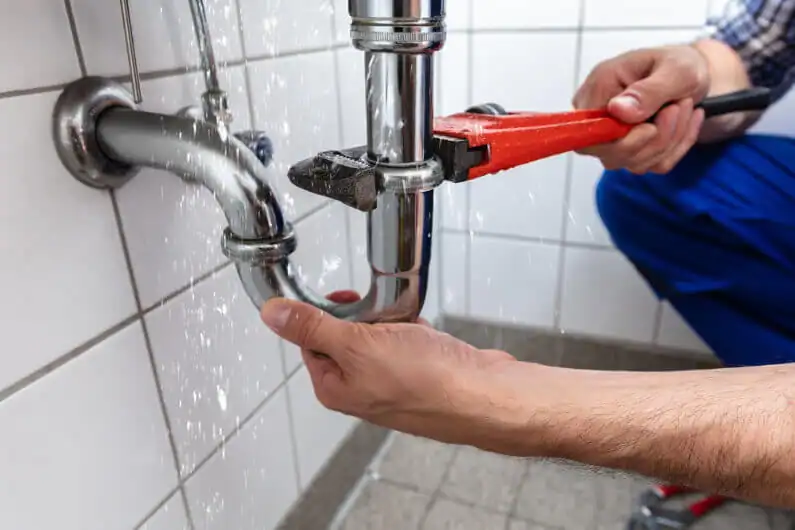 Plumber-Working-On-Drain-Repair