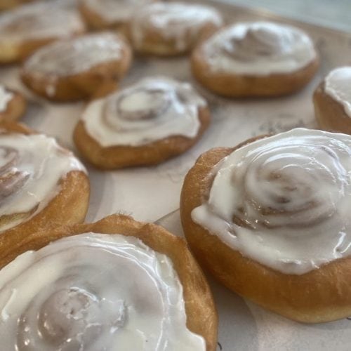 Delicious cinnamon sugar donuts from Knead Donuts, New Zealand's favourite. Freshly baked and topped with creamy icing.
