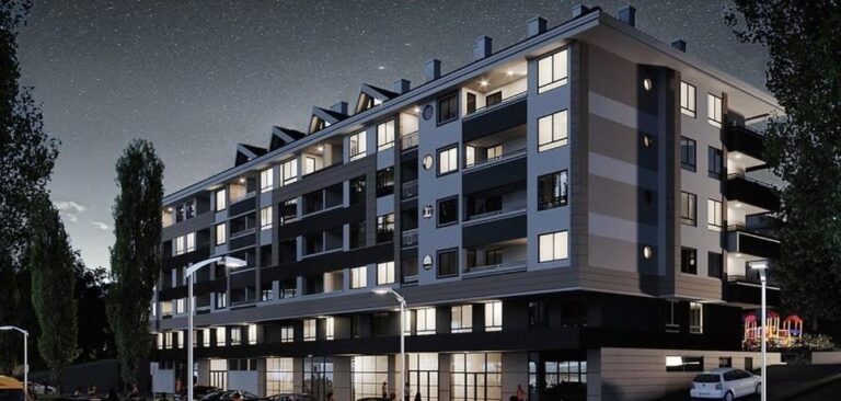 Noćni pogled na moderno uređenu zgradu Apartmana Maletić u mirnom dijelu Banje Luke.