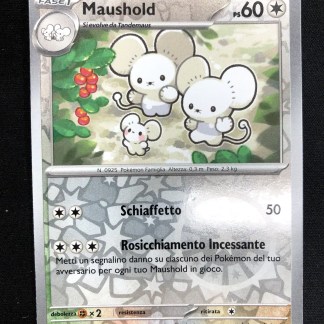 Carta Pokémon Mausolid con disegno anime e dettagli di attacco.