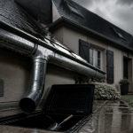 Evacuation eaux pluviales gouttière zinc regard