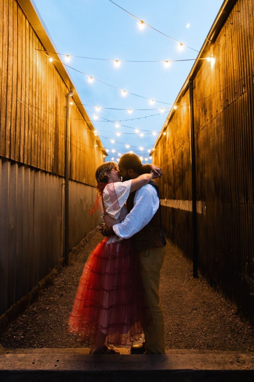 Photography of a yellow DIY wedding in a barn by London photographer Lauren Squire