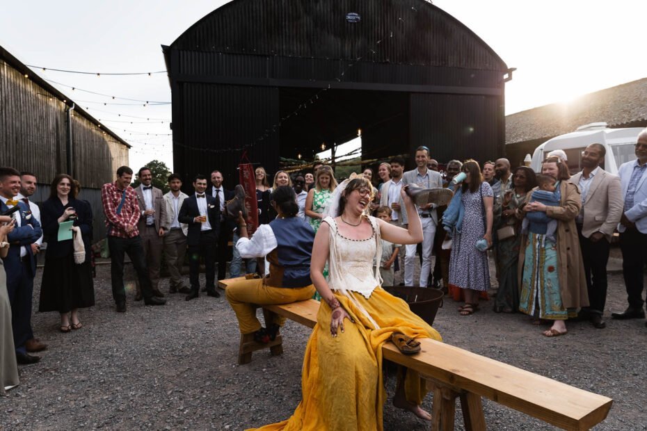 Photography of a yellow DIY wedding in a barn by London photographer Lauren Squire