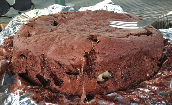 Best Ever Chocolate Cake Recipe - Need a great camping dessert recipe? This Chocolate Cake recipe is made using a cake mix and baked in the dutch oven. It is so rich and delicious!