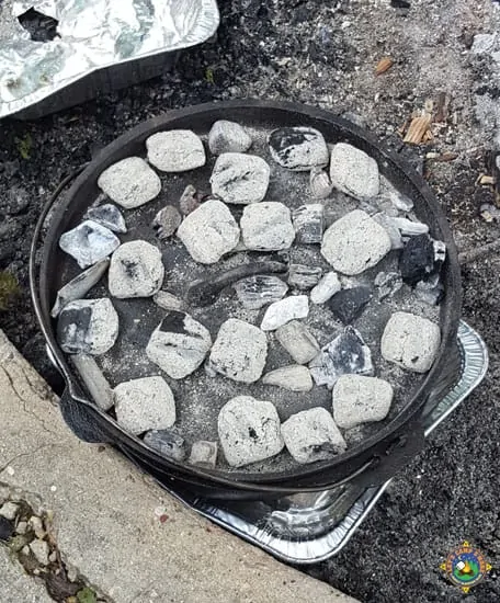 Dutch oven with coals on the lid