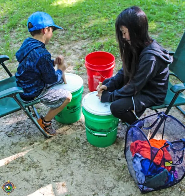 kids doing laundry by hand