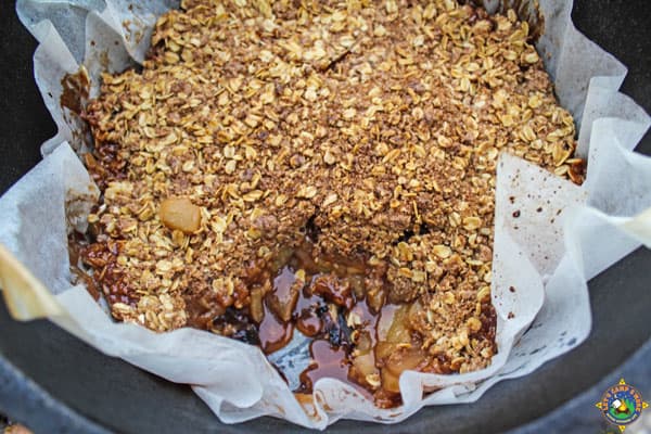 close up of apple crisp in a Dutch oven