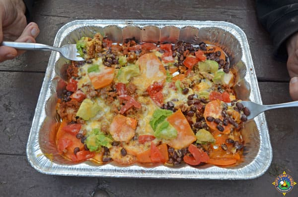 sweet potato nachos being eaten with forks