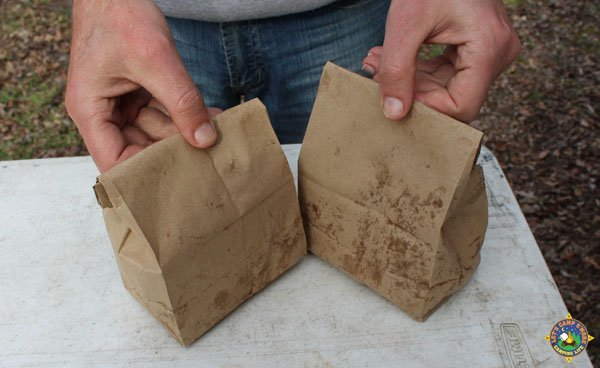 2 bags filled with eggs and bacon