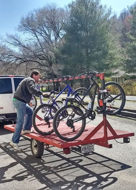 Virginia Creeper Trail Bike Shuttle rental bikes being loaded on a trailer in Damascus Virginia