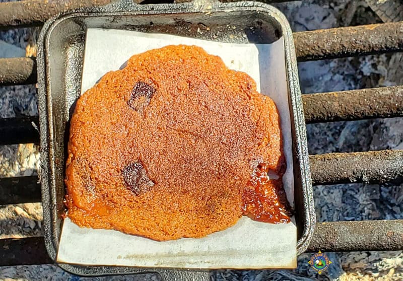 a chocolate cookie that was baked while camping