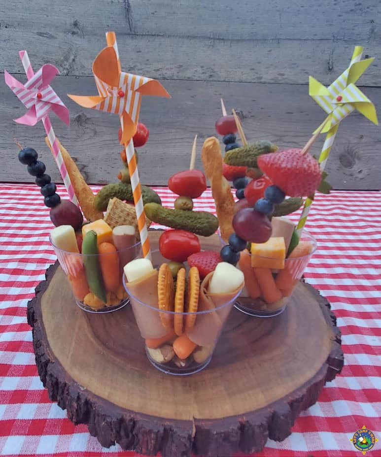 3 charcuterie cups with pinwheel straws