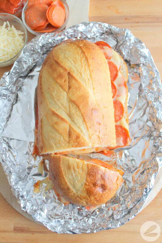 large grilled pizza sandwich on French bread