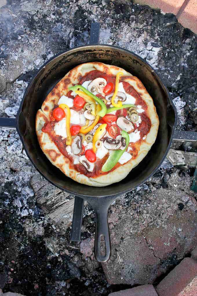 vegetarian pizza made over the campfire