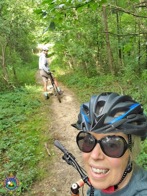 selfie of a couple mountain biking