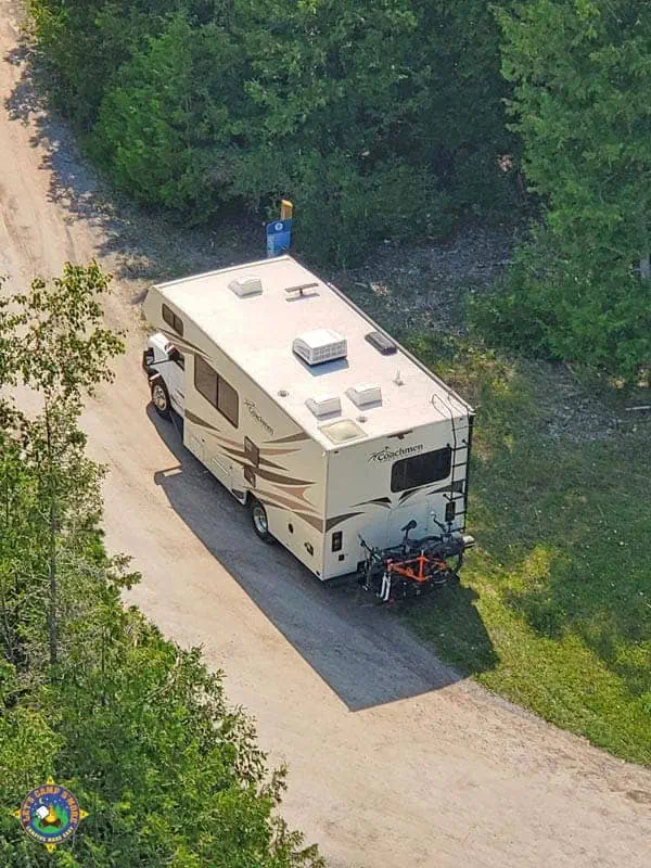 aerial photo of a motorhome taken from the top of a lighthouse in Michigan