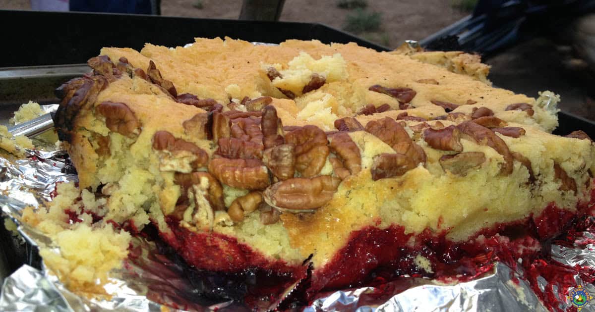 dump cake make in a dutch oven with pecans on top