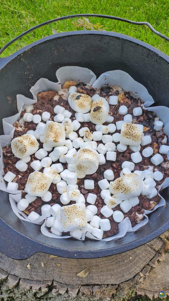 a dutch oven filled with Chocolate S'more Dump Cake