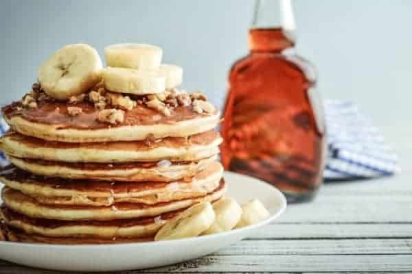 stack of banana pancakes with syrup