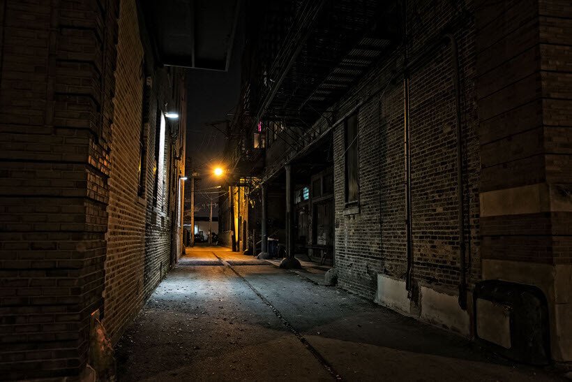 Dark urban city alley at night