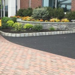 Asphalt & Masonry Stone and asphalt driveway