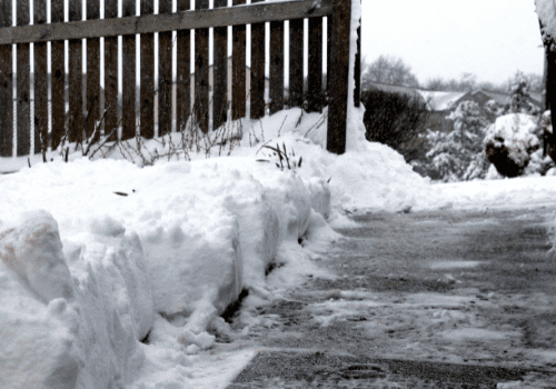 water pooling at end of driveway rutting, water pooling at end of driveway