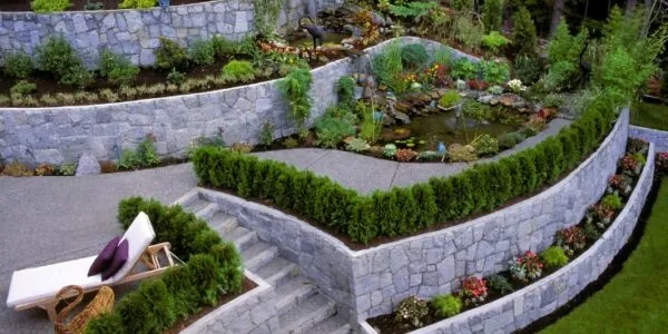 luxury sloped backyard retaining wall
